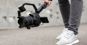 man-holding-a-camera-on-a-gimbal